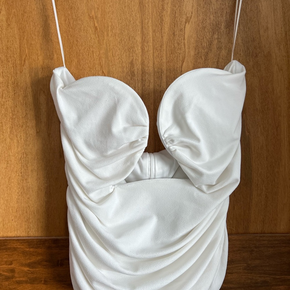 Elegant White Women's Top from Calypso Boutique